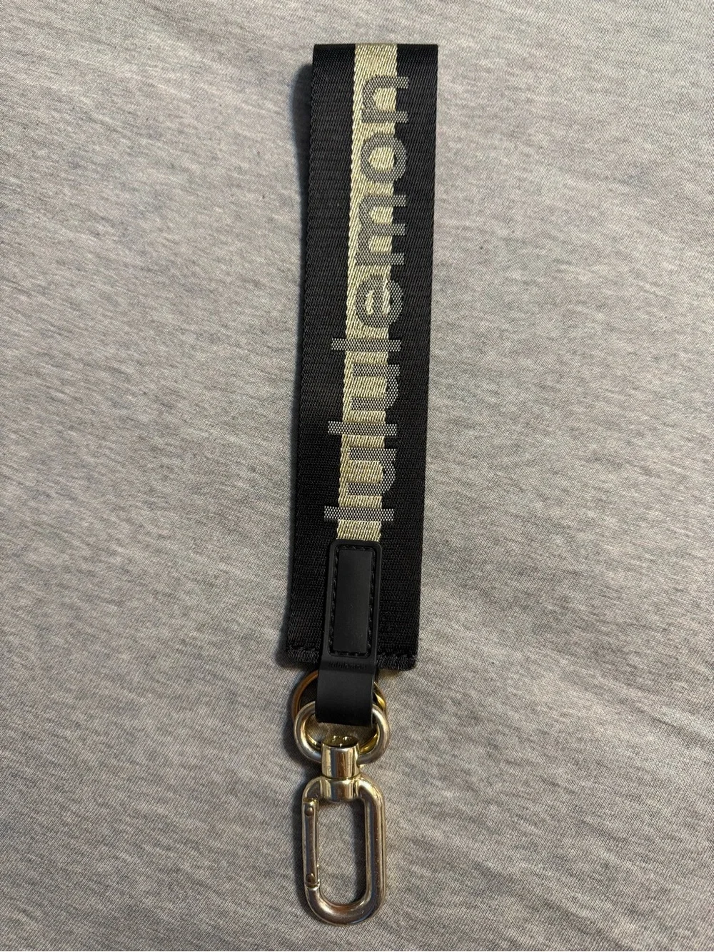 lululemon athletica Black and Gold Logo Key Strap
